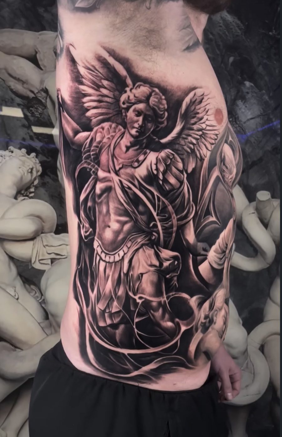 Black and grey realism tattoo by Scrappy 1