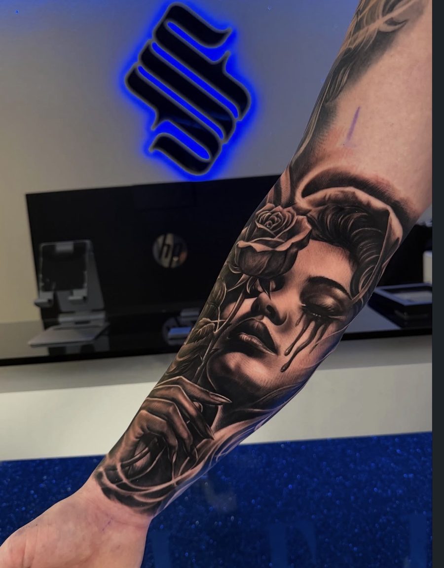 Black and grey realism tattoo by Scrappy 6