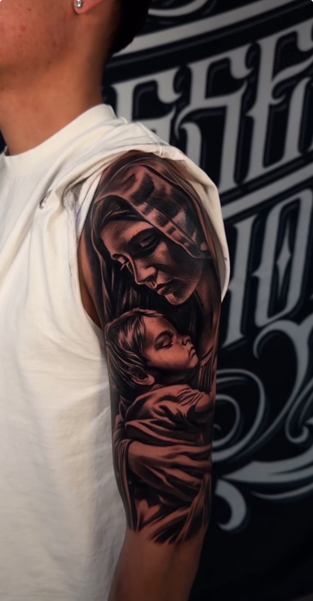 Black and grey realism tattoo by Scrappy 5
