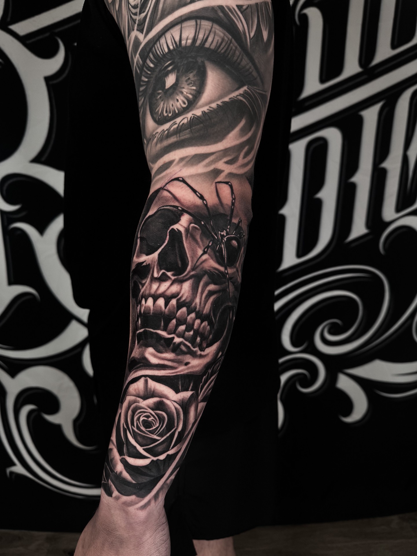 Black and grey realism tattoo by Scrappy 3