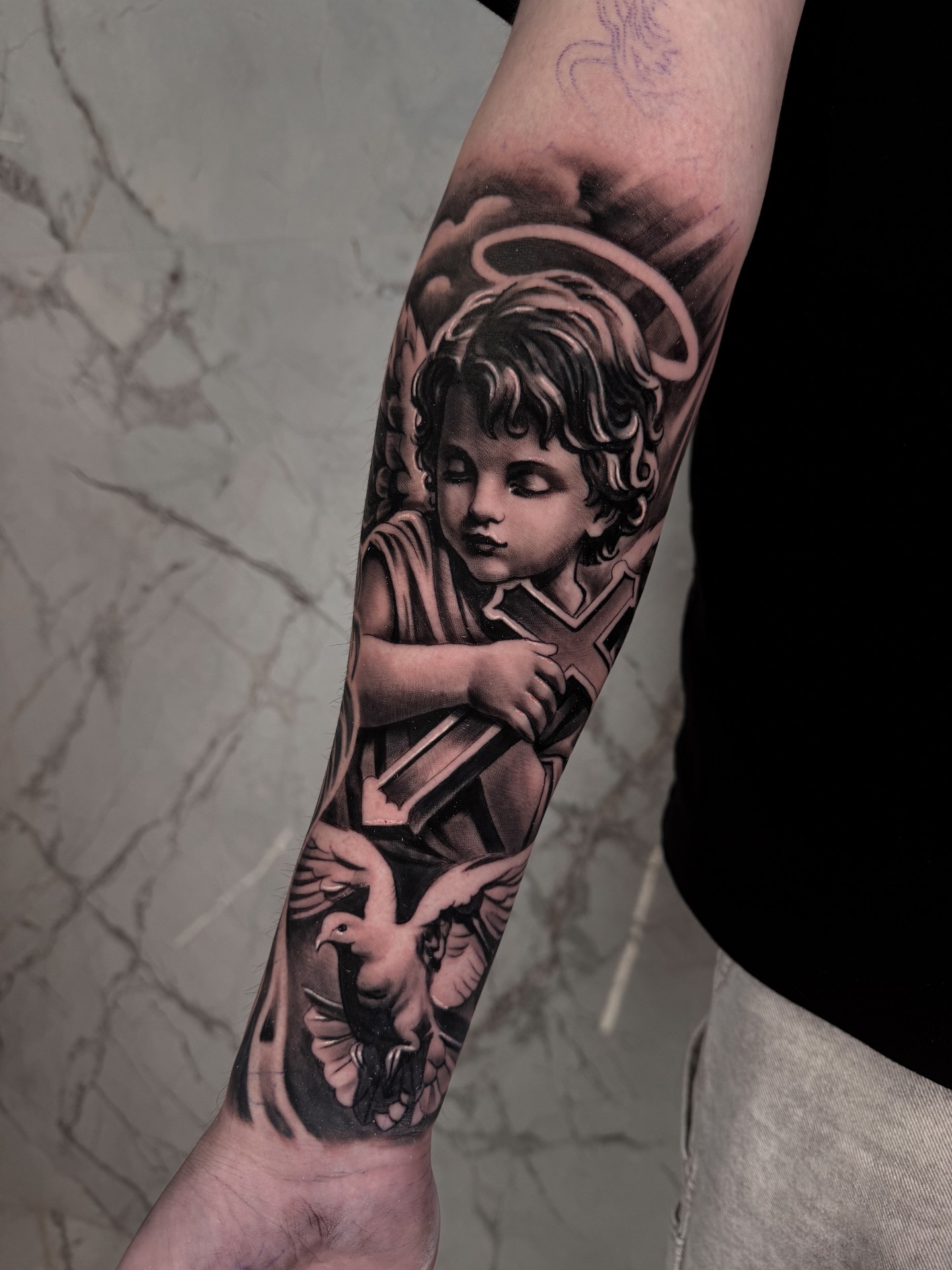 Black and grey realism tattoo by Scrappy 5